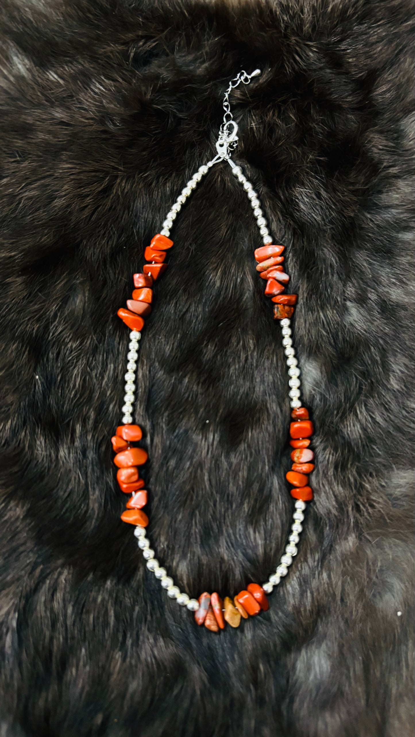 Red Stone with Pearls