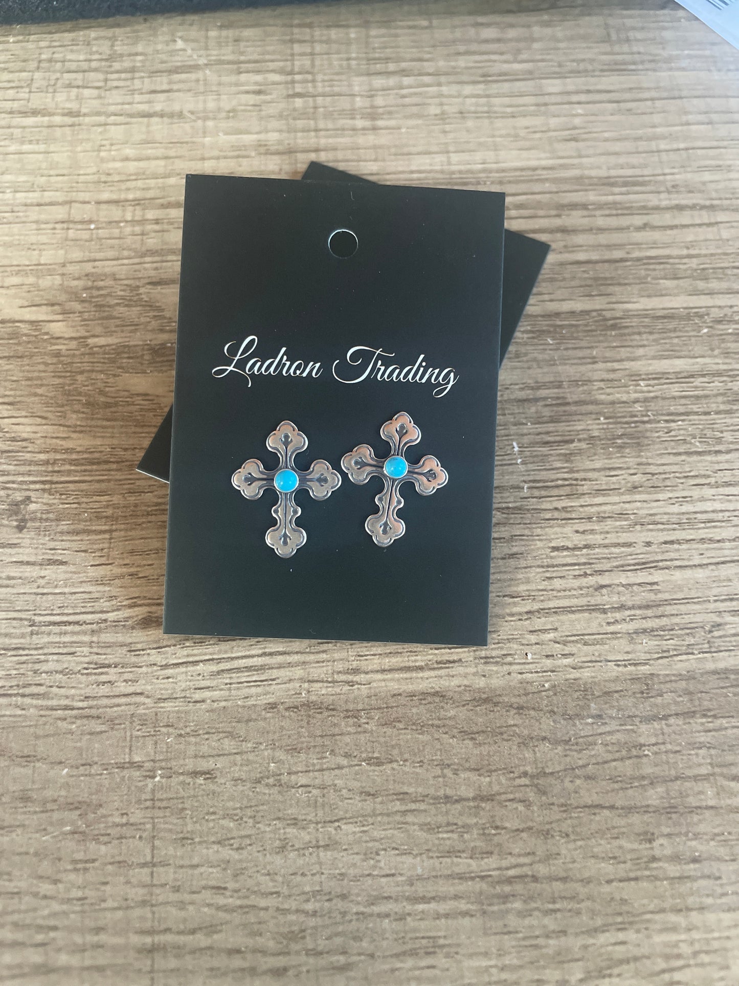 Cross stud earrings