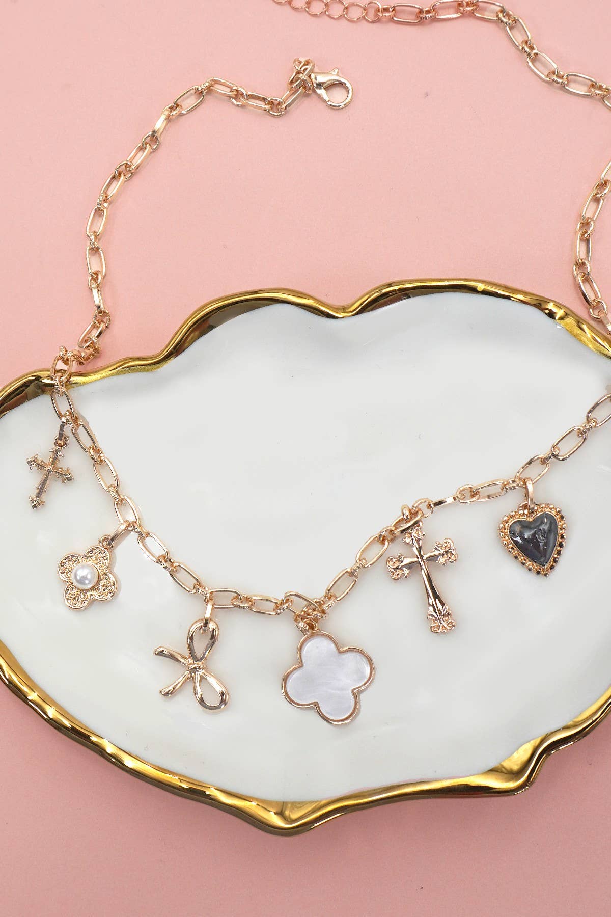 Cross bow charm necklace